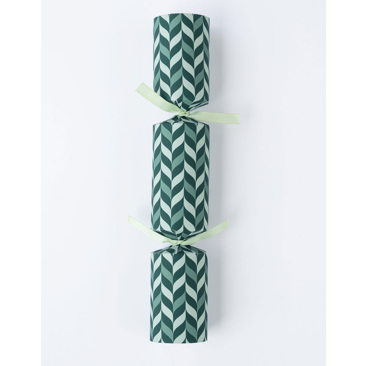 Single Christmas cracker with a green and white chevron pattern and light green ribbon ties.