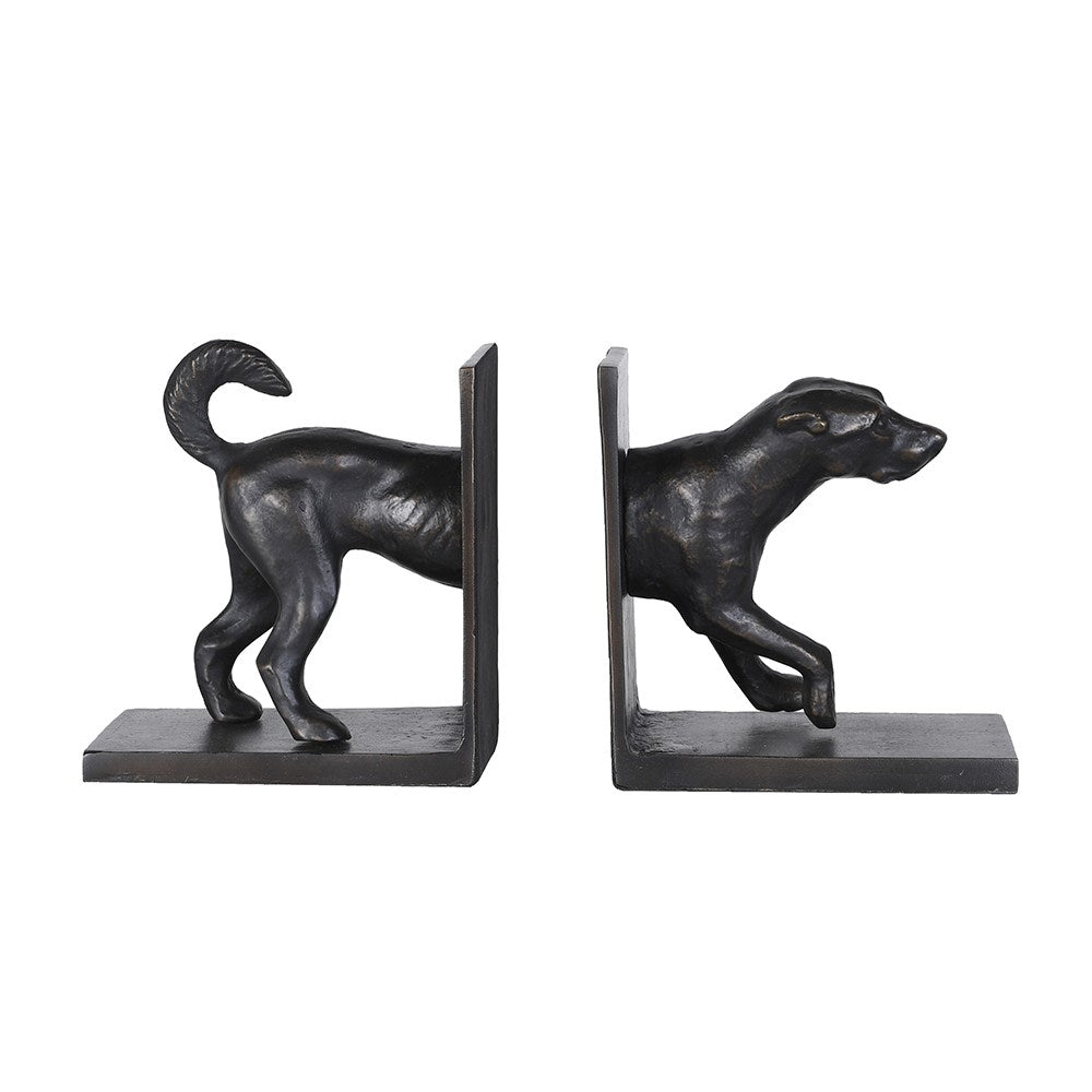 Side view of vintage hound bookends showing the front and back of the dog sculpture.