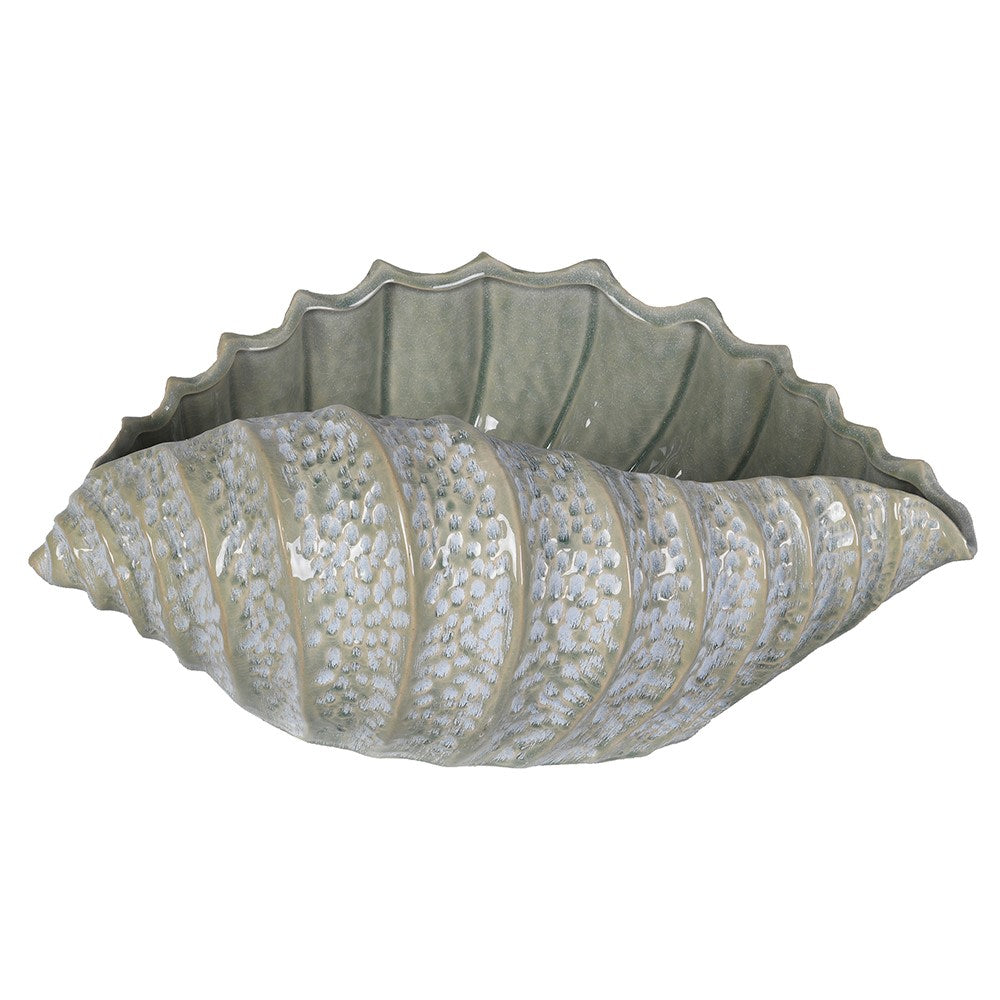 Front view of the large ceramic shell decoration highlighting its wide, fluid coastal form.