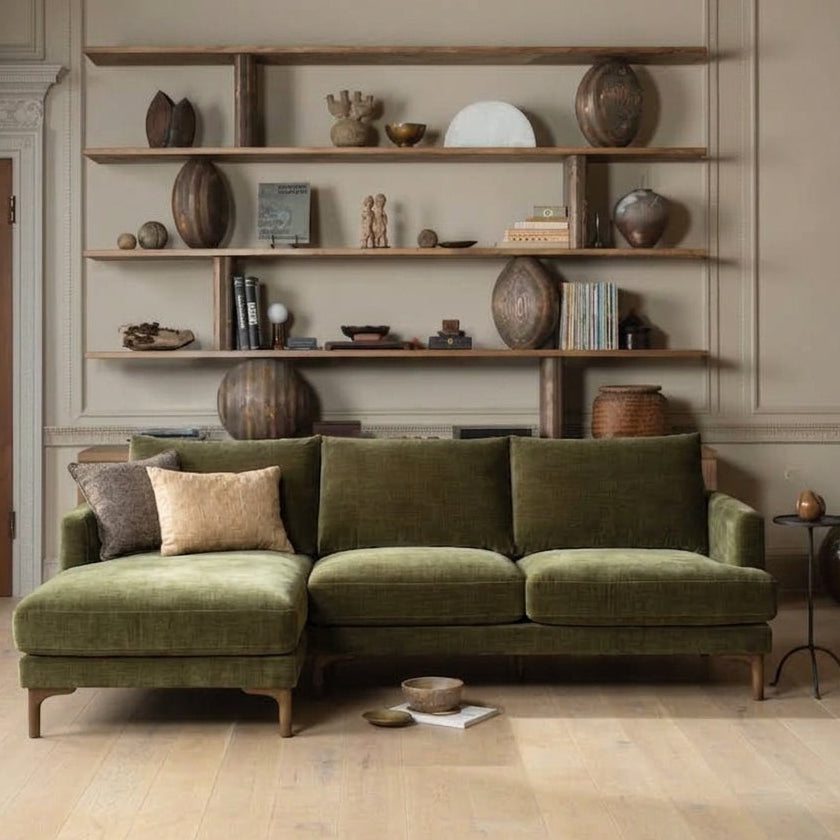 Front view of the olive green Florence corner sofa with left-hand chaise in a living room setting