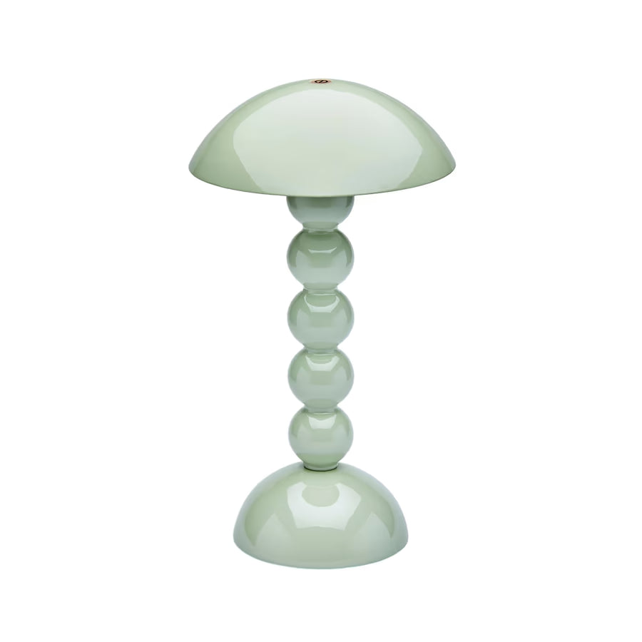 High-gloss sage green bobbin LED lamp with a domed shade and spherical stacked base