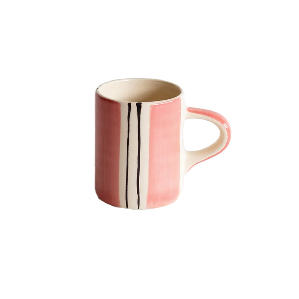 Hand-painted rose pink espresso mug with dark vertical stripes on a white background.
