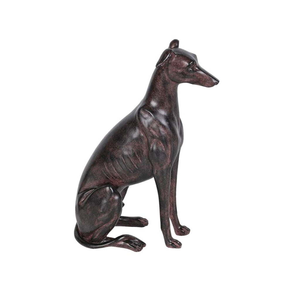 Side profile of a slender sitting dog ornament showing the textured finish and long neck.