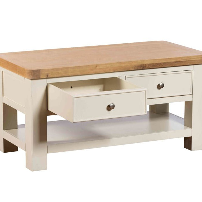 Burford coffee table with one drawer partially open against a plain white background