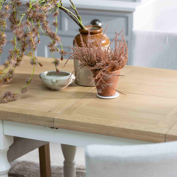 Close-up of the natural oak wood grain and joinery on the Burford dining table top