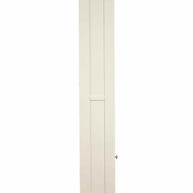 Side profile of the slim white painted storage bookcase showing the oak top overhang