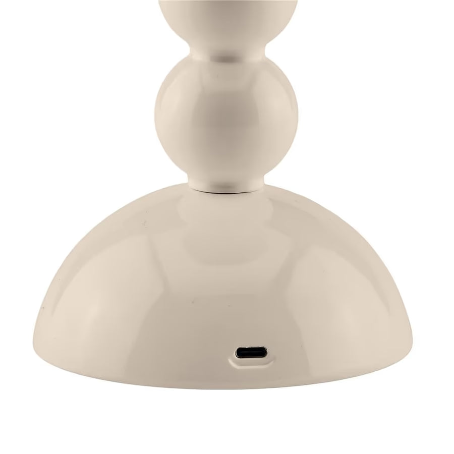 Detail shot of the USB-C charging port located on the base of the bobbin lamp.