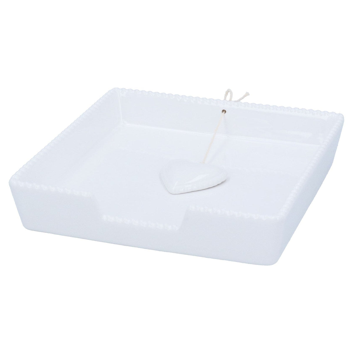 White stoneware napkin holder with a beaded edge and a ceramic heart weight on a cord.