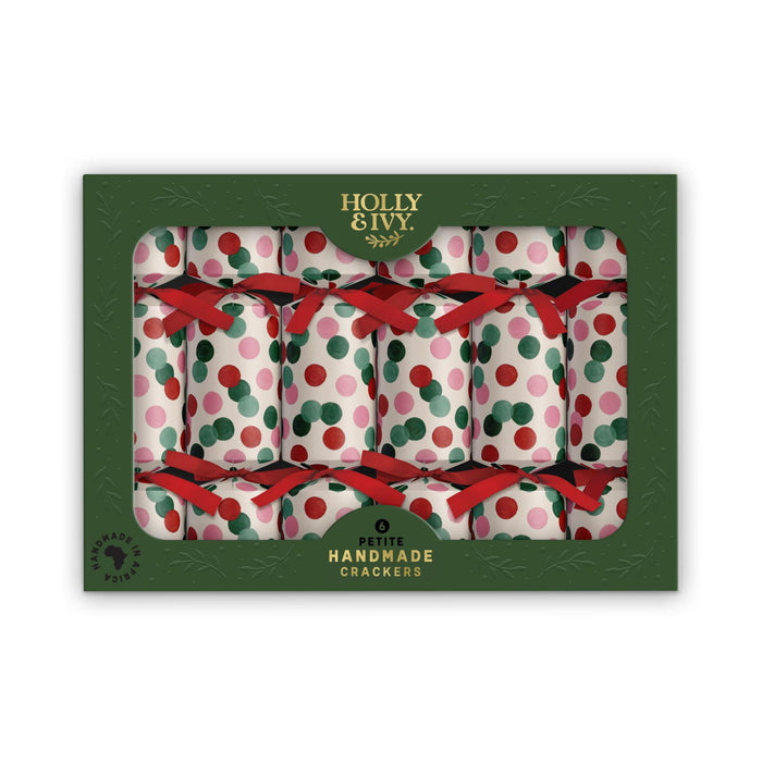 Boxed set of 6 petite Christmas crackers with red, pink, and green confetti dots and red ribbon ties.