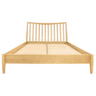 Front view of the empty oak bed frame showing the wooden slat support system