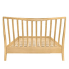 Rear view of the Larsen light oak headboard showing the vertical spindle design