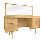 Angled view showing the light oak grain and tapered legs of the mid-century inspired dressing table.
