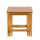 Front view of the G Plan Larsen oak nest of tables fully nested to show the space-saving design.