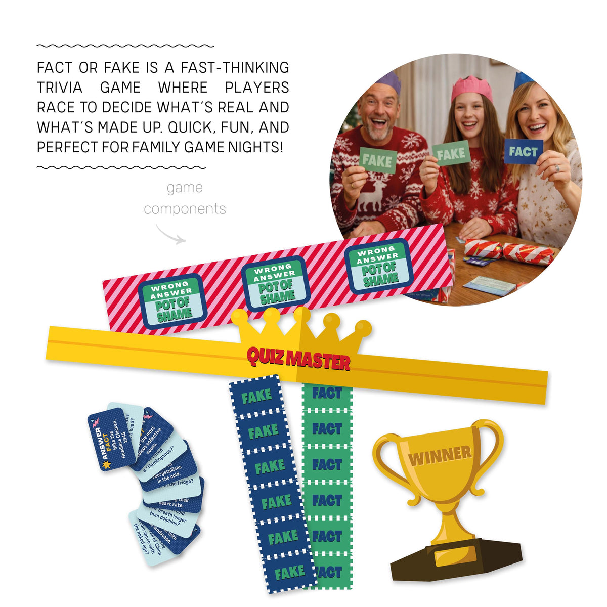 Family playing Fact or Fake trivia game with game cards and paper crowns at Christmas.