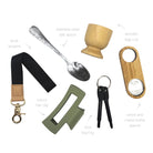 Visual guide of premium cracker gifts including a tool keyring, hair clip, and salt spoon.