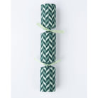 Single Christmas cracker with a green and white chevron pattern and light green ribbon ties.