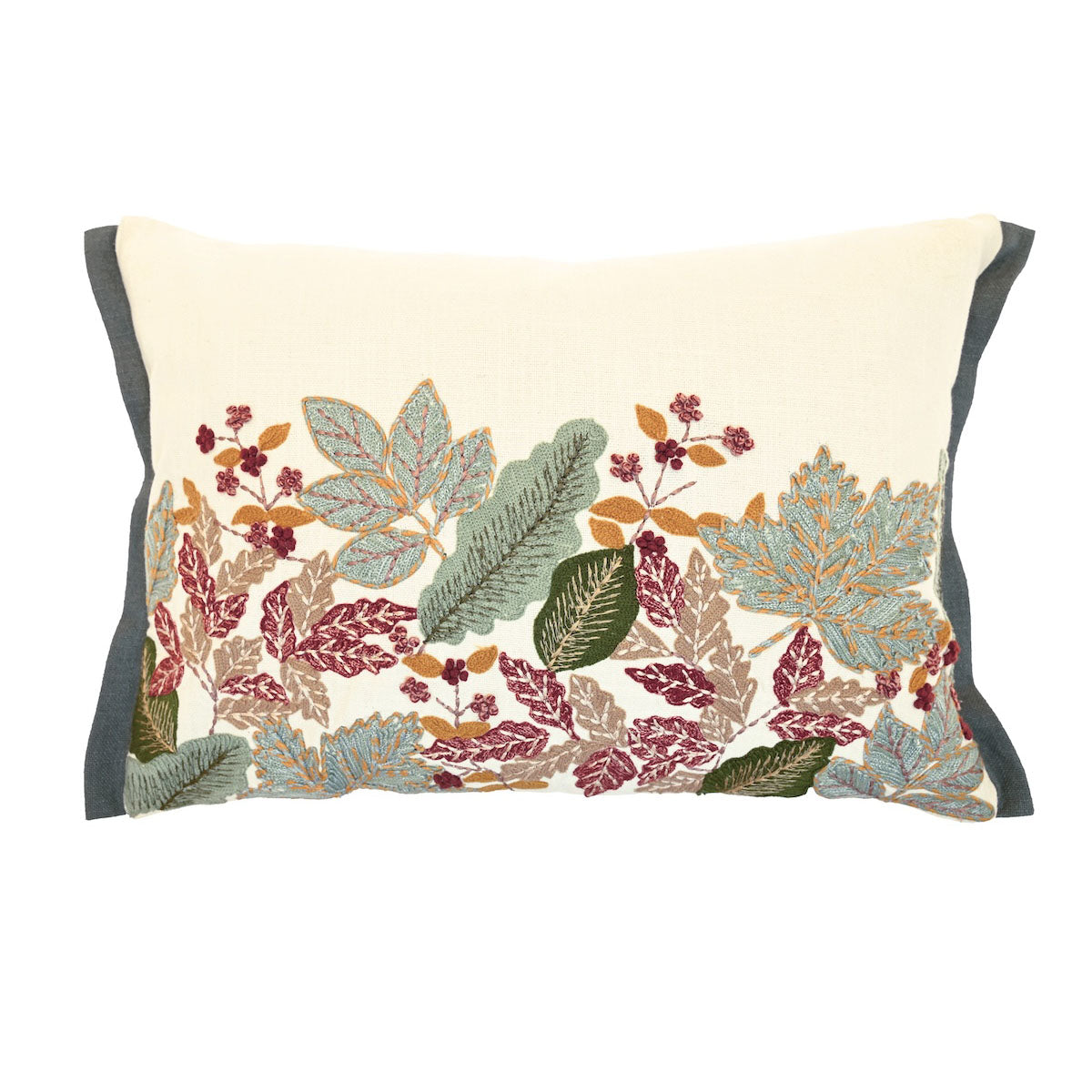 Rectangular cream cotton cushion with embroidered green, red and gold leaves and a dark green piped edge.
