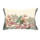 Rectangular cream cotton cushion with embroidered green, red and gold leaves and a dark green piped edge.