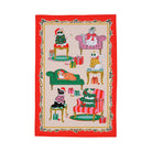 Red-bordered Christmas tea towel with illustrations of cats in festive outfits on furniture