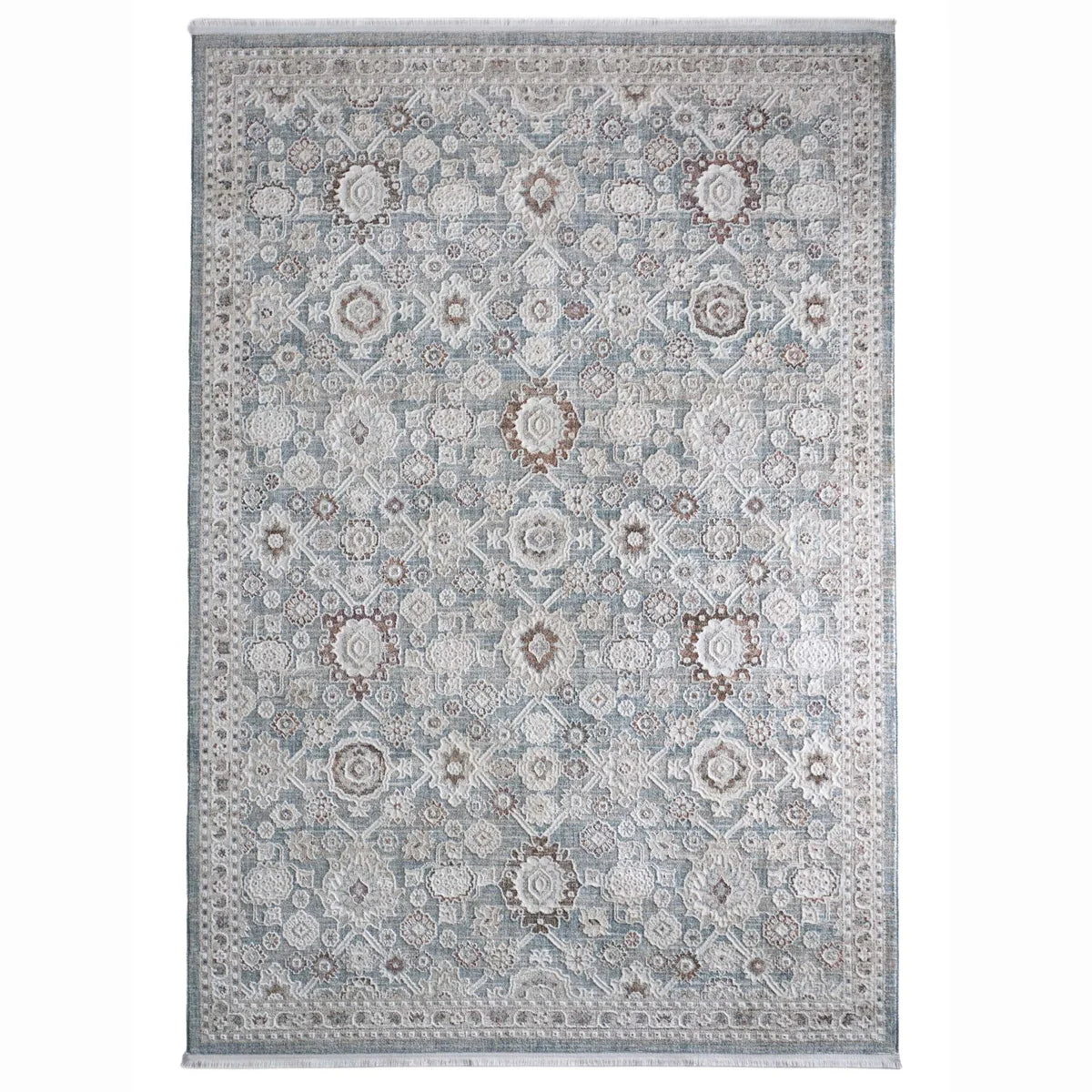 Overhead view of Celeste Sea Green rug showing intricate floral pattern and short white fringe.