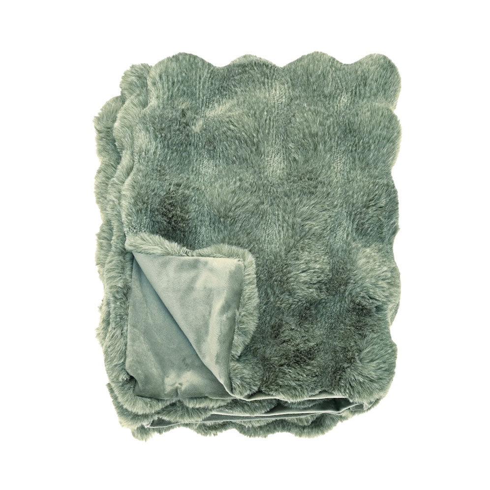 Folded eucalyptus green faux fur throw showing the soft textured surface and smooth lining
