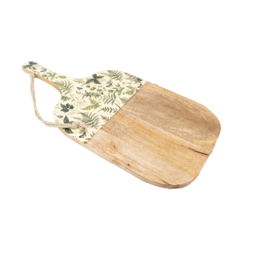 Angled view of the fern print mango wood serving board showing the natural wood grain and handle detail.