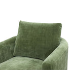 Close-up of the back cushion and textured green fabric of the Florence chair