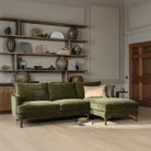 Florence corner sofa in olive green fabric with right-hand chaise and tapered wooden legs