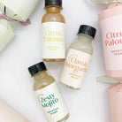 Three 100ml mocktail mixer bottles: Citrus Paloma, Classic Margarita, and Zesty Mojito.