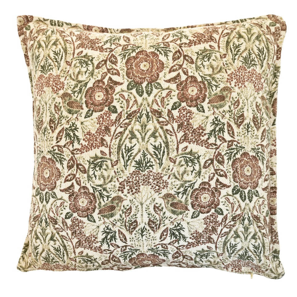 Jenny Wren cushion featuring a detailed green and terracotta floral and bird pattern on a neutral background.