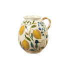 Glazed ceramic jug vase with yellow lemon and blue berry pattern on a cream background