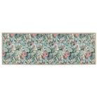 Narrow runner rug featuring a repeated botanical lily pattern
