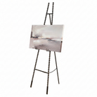 Antique gold beaded easel displaying a landscape abstract canvas painting.