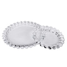 Large and small beaded glass candle plates shown together to demonstrate size difference