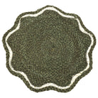 Green scalloped jute placemat showing the circular woven texture and white stitched border detail.
