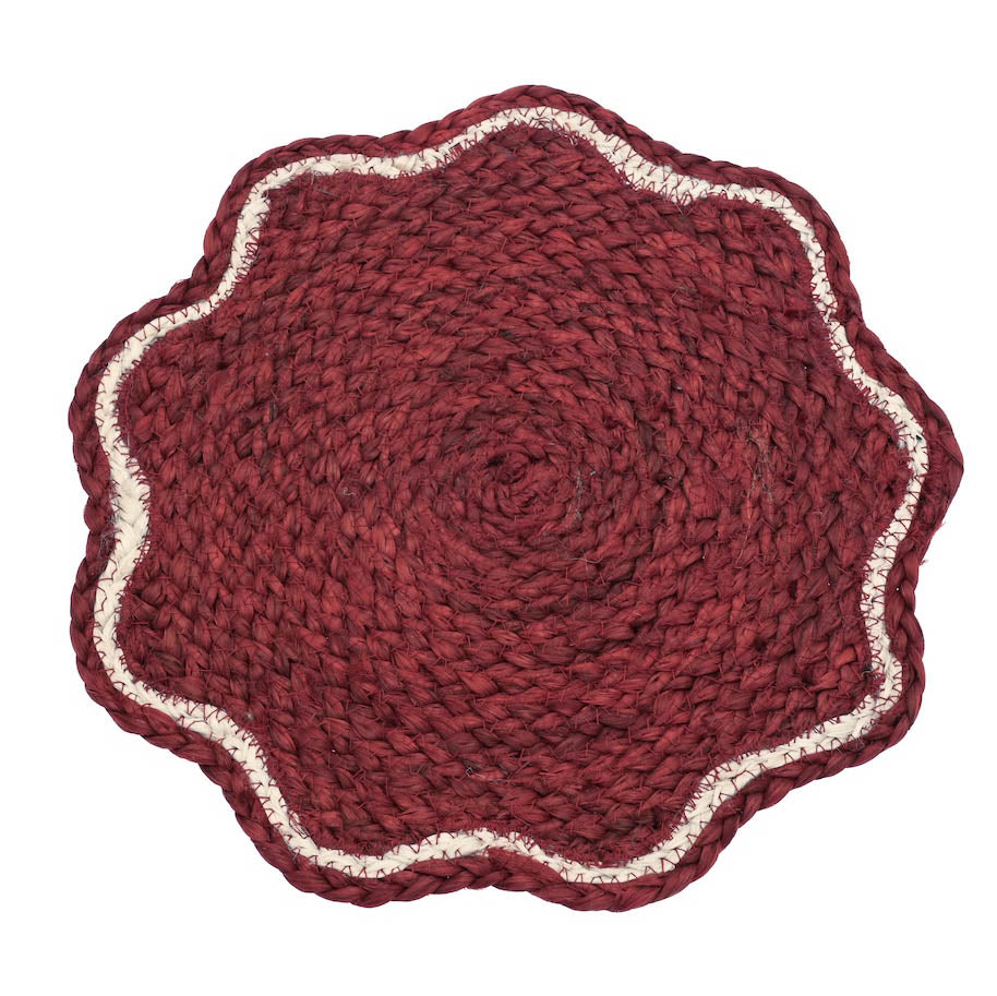 Circular red jute placemat with a scalloped edge and cream accent border on a white background.