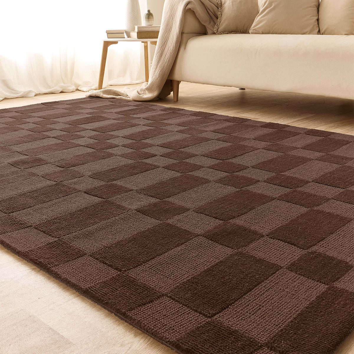 Low angle view of the chocolate brown Soho rug showing the depth of the textured pile heights.