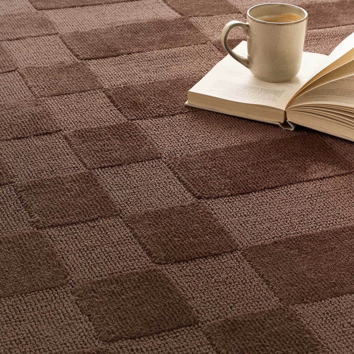 Close-up detail of the Soho rug showing the textured contrast between the high tufted pile and low loop pile.