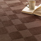 Close-up detail of the Soho rug showing the textured contrast between the high tufted pile and low loop pile.