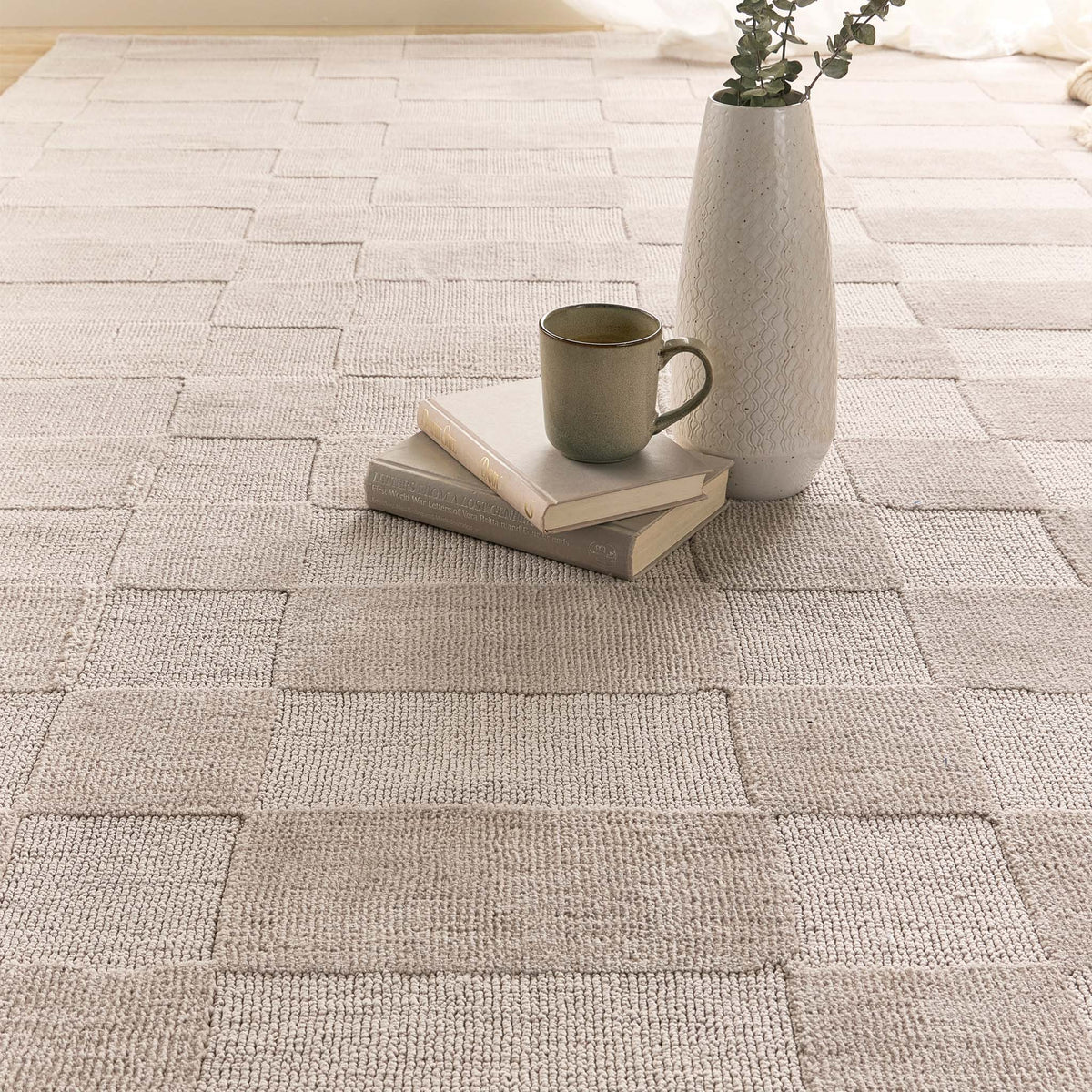 Close-up of the Soho rug showing the textured difference between the high tufted and low loop pile.