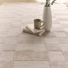 Close-up of the Soho rug showing the textured difference between the high tufted and low loop pile.