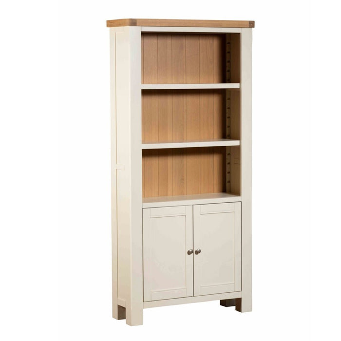 White painted storage bookcase with natural oak top against a plain white background