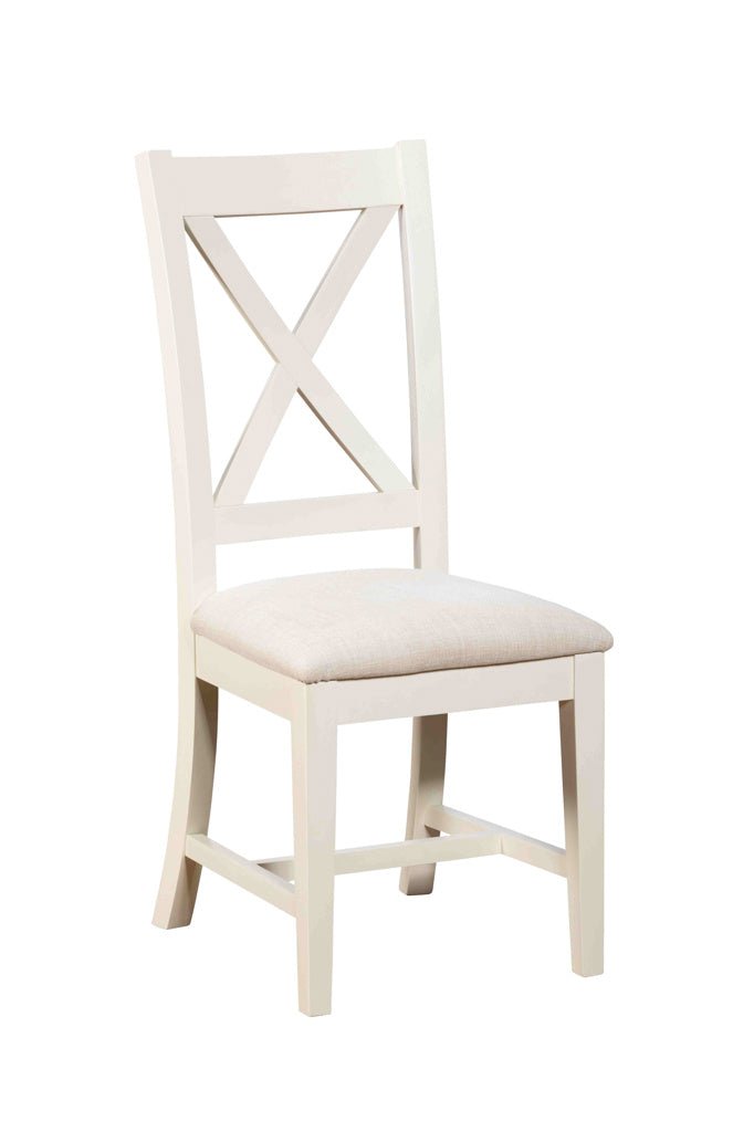 White painted Burford X-Frame dining chair with neutral upholstered seat against a plain white background