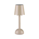 A portable scallop LED lamp in a glossy cappuccino lacquer finish against a plain white background.