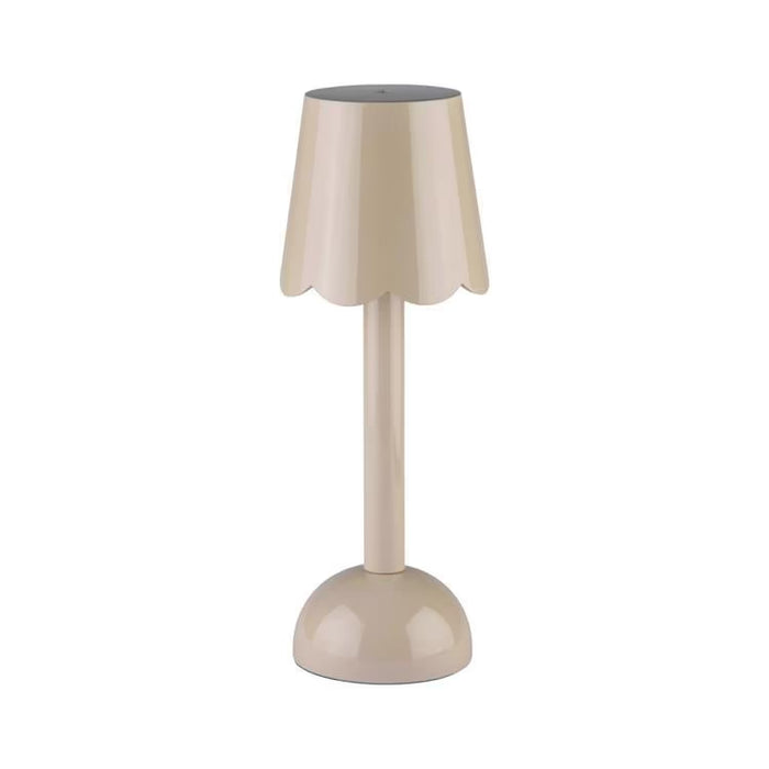 A portable scallop LED lamp in a glossy cappuccino lacquer finish against a plain white background.