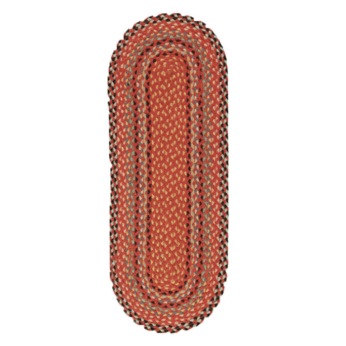 Oval braided jute table runner in a vibrant red cardinal interwoven design