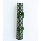A single 14-inch green Christmas cracker with two velvet bows against a plain white background.
