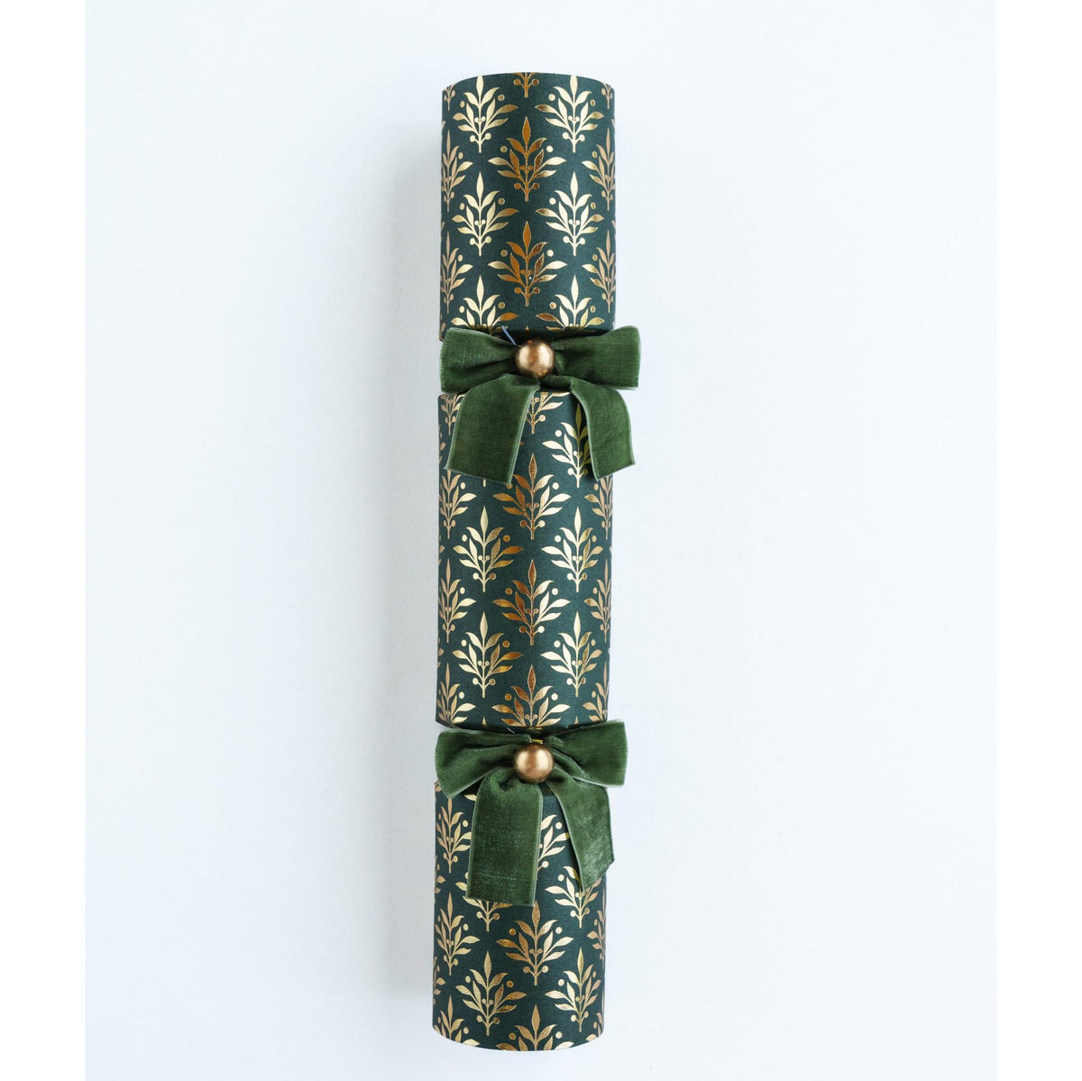A single 14-inch green Christmas cracker with two velvet bows against a plain white background.