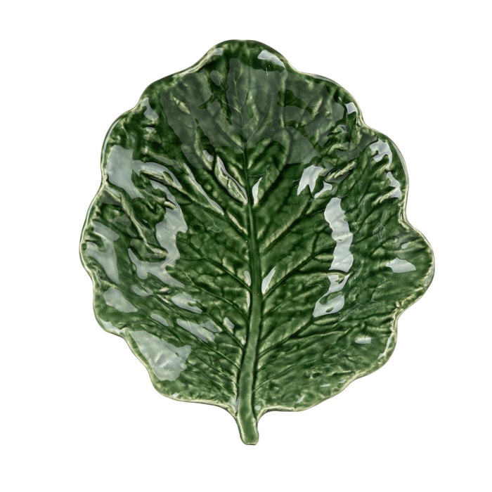 Top-down view of a vibrant green pottery plate shaped like a detailed leaf with visible veins.