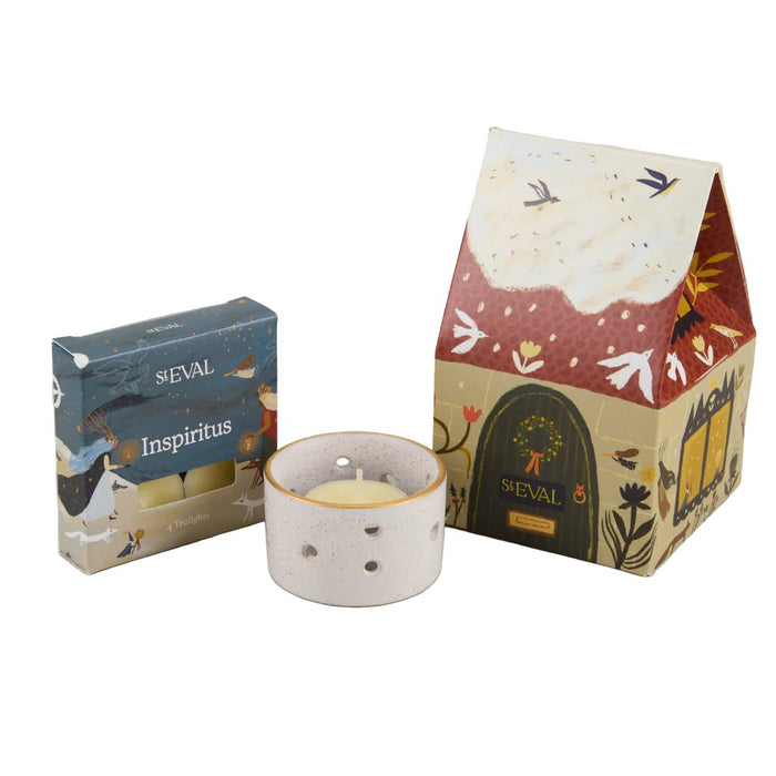 Inspiritus Christmas Cottage set including a tealight holder, pack of four tealights, and illustrated cottage packaging